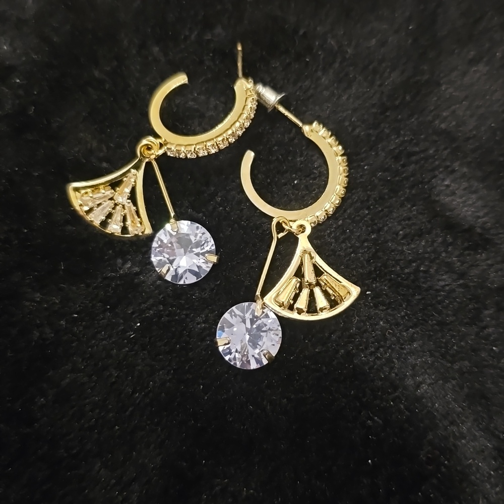 Gold and diamond earrings